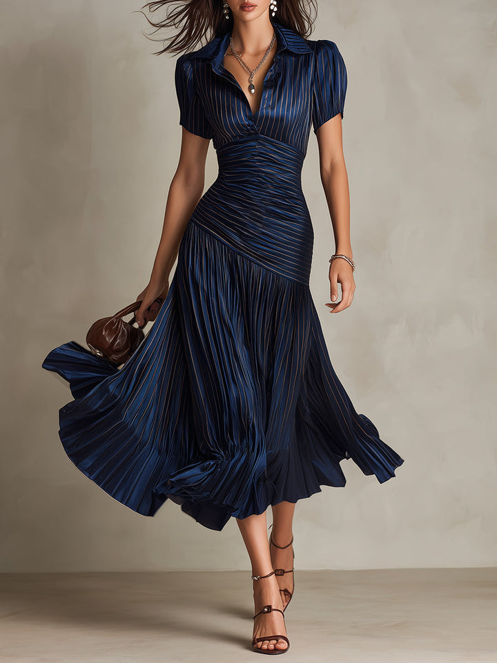 Navy blue ruched midi dress with V-neck and short sleeves, pleated flared skirt