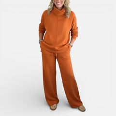 Orange hooded two-piece lounge set: long-sleeve top and wide-leg pants