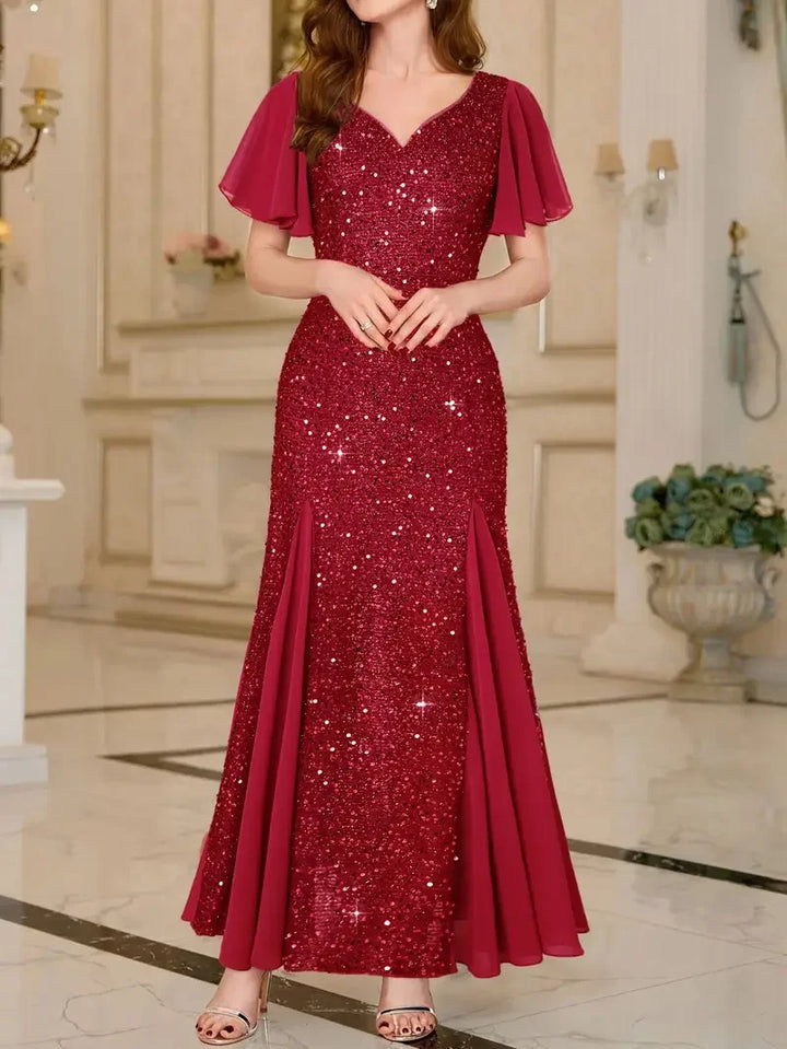 Red sequin satin dress, V-neck, short flutter sleeves, sparkly fitted bodice, flared hem