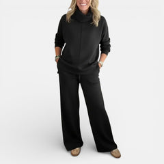 Black two-piece lounge set with hooded pullover and wide-leg pants
