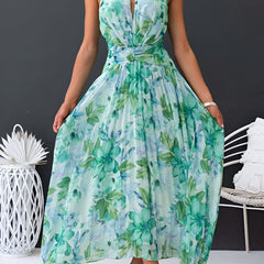 Floral halter midi dress in aqua and teal floral print with cinched waist