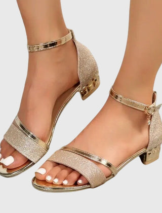 Orthopedic heeled sandals with silver glitter straps and metallic ankle strap, low gold-tone heel