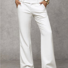 White high-rise wide-leg trousers with button closure and belt loops