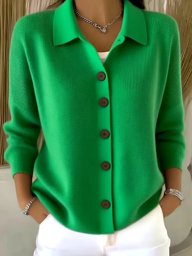 Bright green button-front knit cardigan with point collar and dark buttons, long sleeves