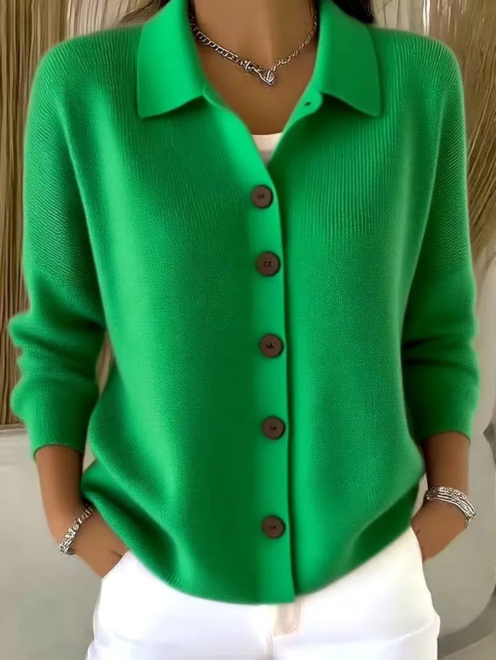 Bright green button-front knit cardigan with point collar and dark buttons, long sleeves