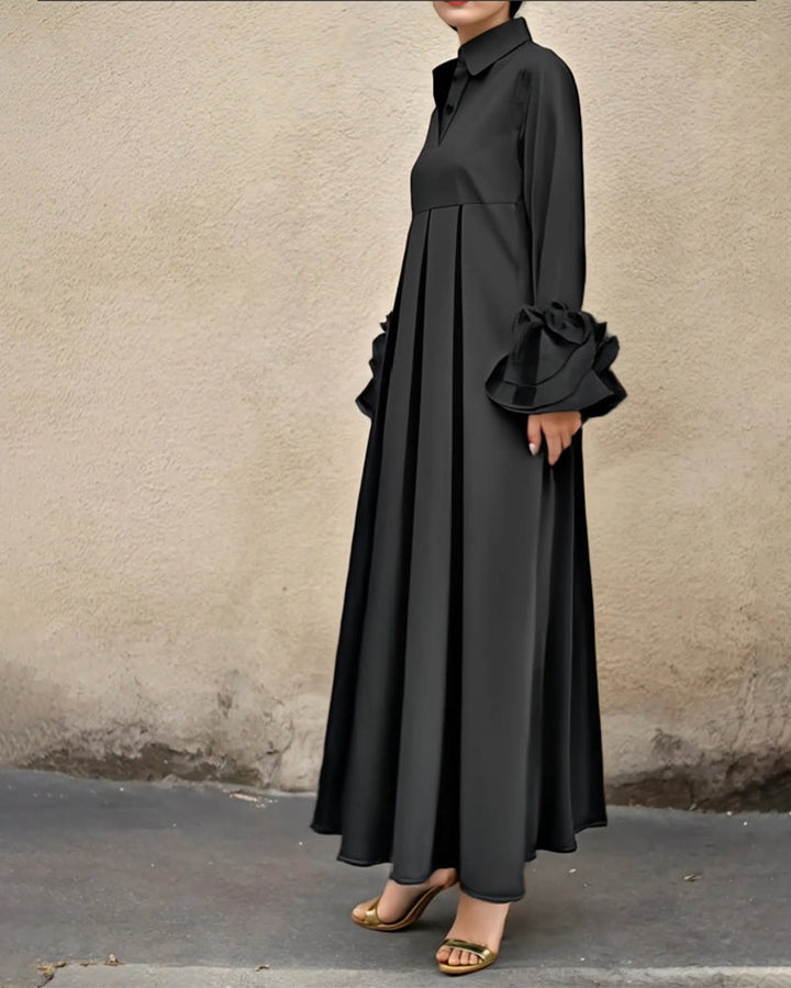 Black shirt maxi dress with collar, long sleeves, button placket, pleated flared skirt