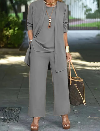 Grey 3-piece lounge set with long tunic, front pockets, and wide-leg pants