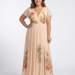 Peach pleated maxi dress with V-neck and floral embroidery; short capped sleeves