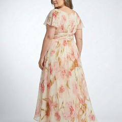 Pink floral maxi dress with wide back neckline, short flutter sleeves, cinched waist