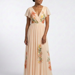 Peach V-neck pleated maxi dress with short sleeves and scattered floral embroidery