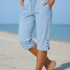 Delphia™ women's calf-length capri pants in light blue with drawstring waist and side buttons