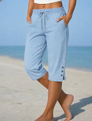 Delphia™ women's calf-length capri pants in light blue with drawstring waist and side buttons