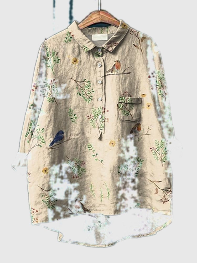 Beige button-up long sleeve shirt with bird and botanical print, chest pocket