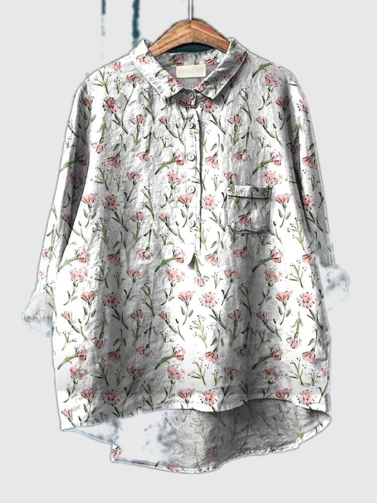 Pink-and-white floral button-up shirt with chest pockets, light gray base