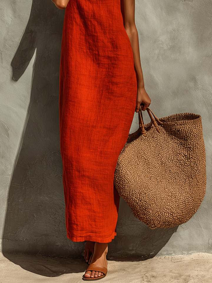 Red textured woven midi dress with thin spaghetti straps and straight hem