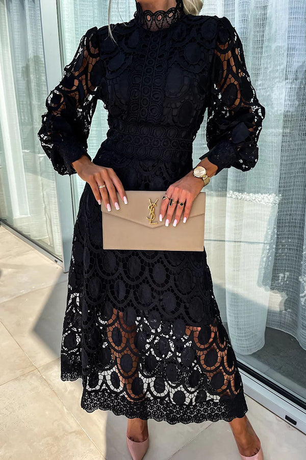 Black lace midi dress with high neck, long puff sleeves, scalloped circular lace pattern.