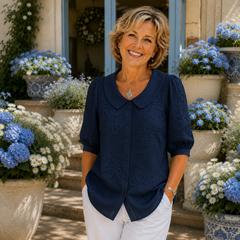 Navy floral embroidered blouse with round collar and short puff sleeves