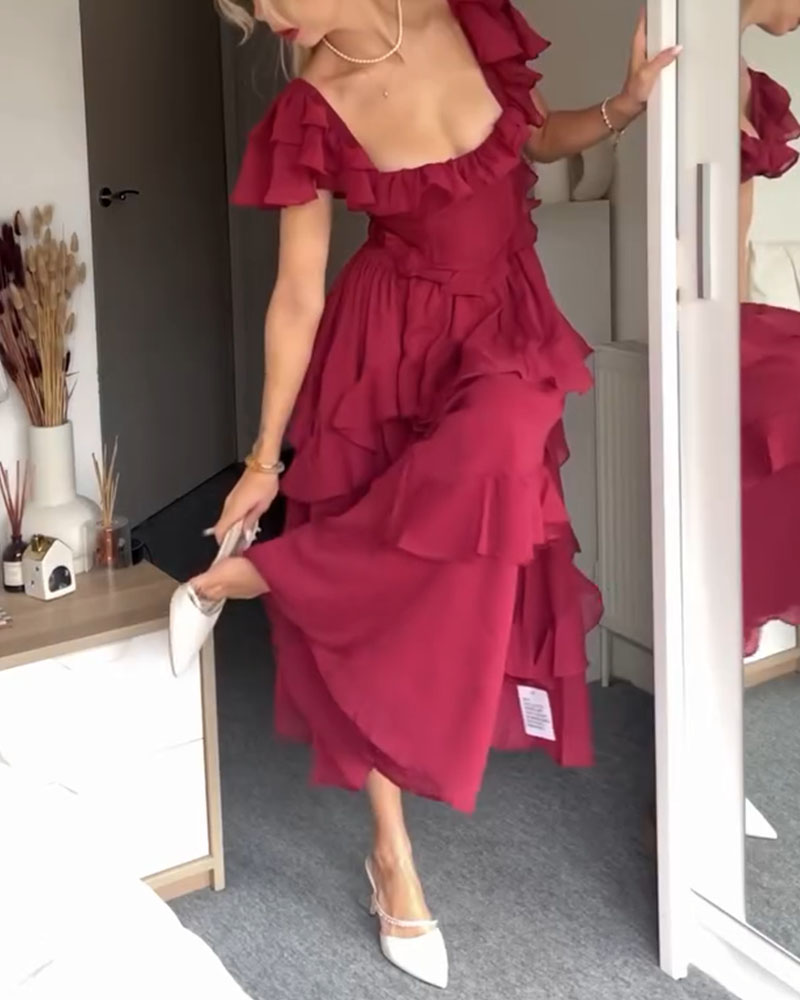 Magenta ruffle midi dress with off-shoulder neckline and layered skirt