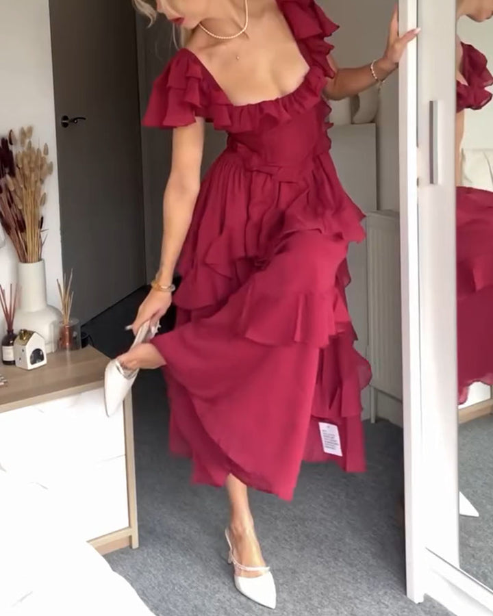 Magenta ruffle midi dress with off-shoulder neckline and layered skirt