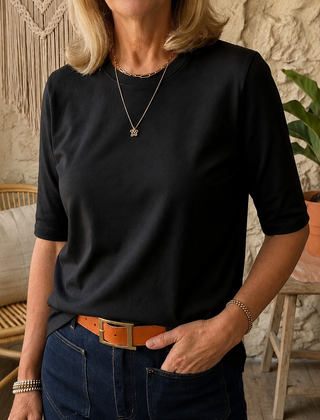 Black crewneck comfort tee with 3/4 sleeves and relaxed draped fit