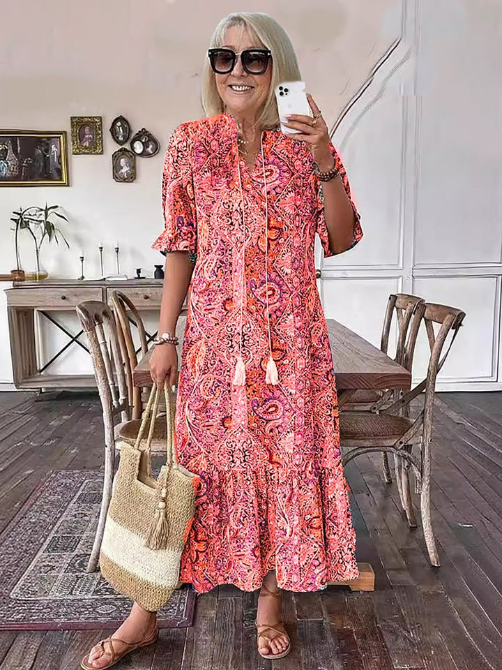 Pink-red paisley Boho Grace dress, short puff sleeves and tassel-tie neckline