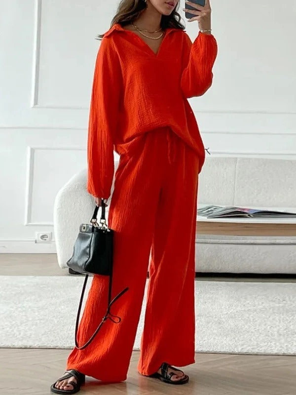 Orange-red V-neck long-sleeve top with matching wide-leg pants, elastic waist