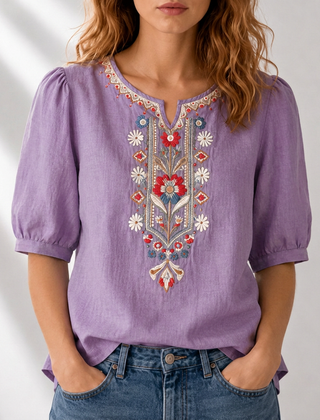 Purple embroidered floral blouse with puff sleeves and colorful V-neck embroidery