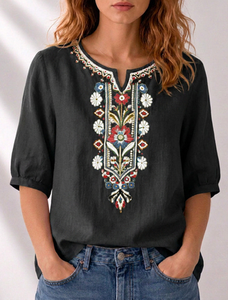 Black embroidered floral blouse with puff sleeves and multicolor V-neck front stitching