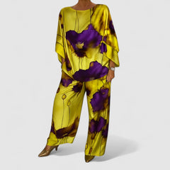 Two-piece set with relaxed top and wide-leg pants, yellow base with purple floral print