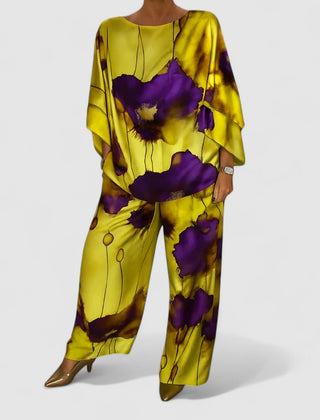 Two-piece set with relaxed top and wide-leg pants, yellow base with purple floral print