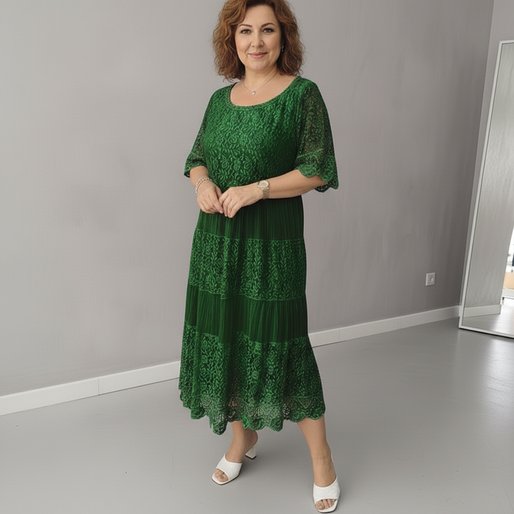 Green lace tiered midi dress with lace panel skirt and elbow flutter sleeves