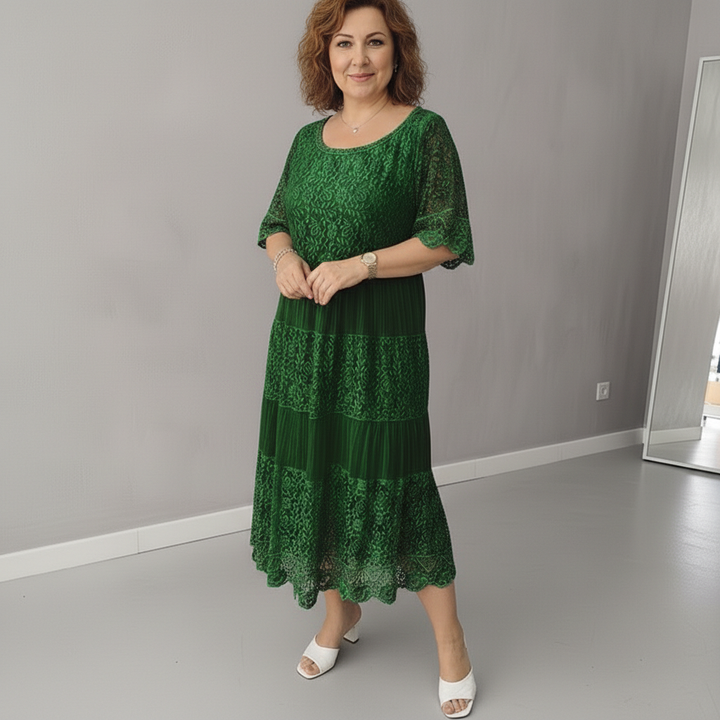 Green lace tiered midi dress with lace panel skirt and elbow flutter sleeves