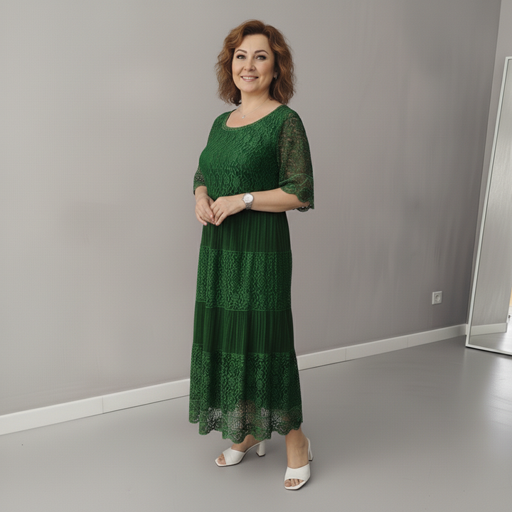 Green lace tiered midi dress with flutter sleeves and lace yoke, full skirt