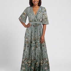 Sage green floral V-neck maxi dress with puff sleeves and tiered hem