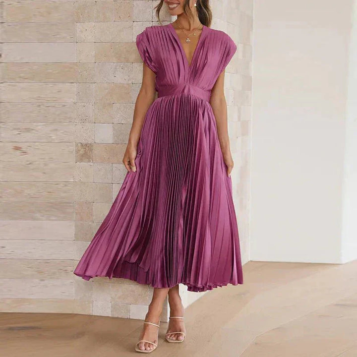 Purple pleated midi dress with V-neck, short sleeves, and cinched gathered waist