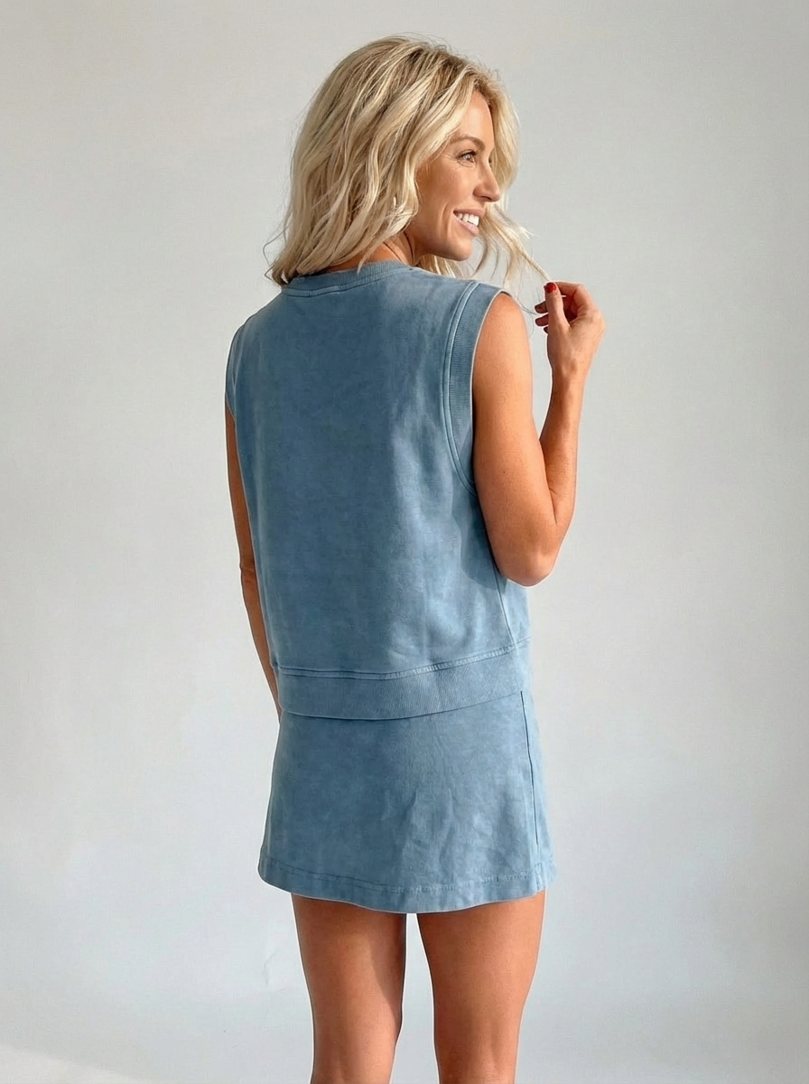 Blue sleeveless crewneck top and matching shorts set, back view