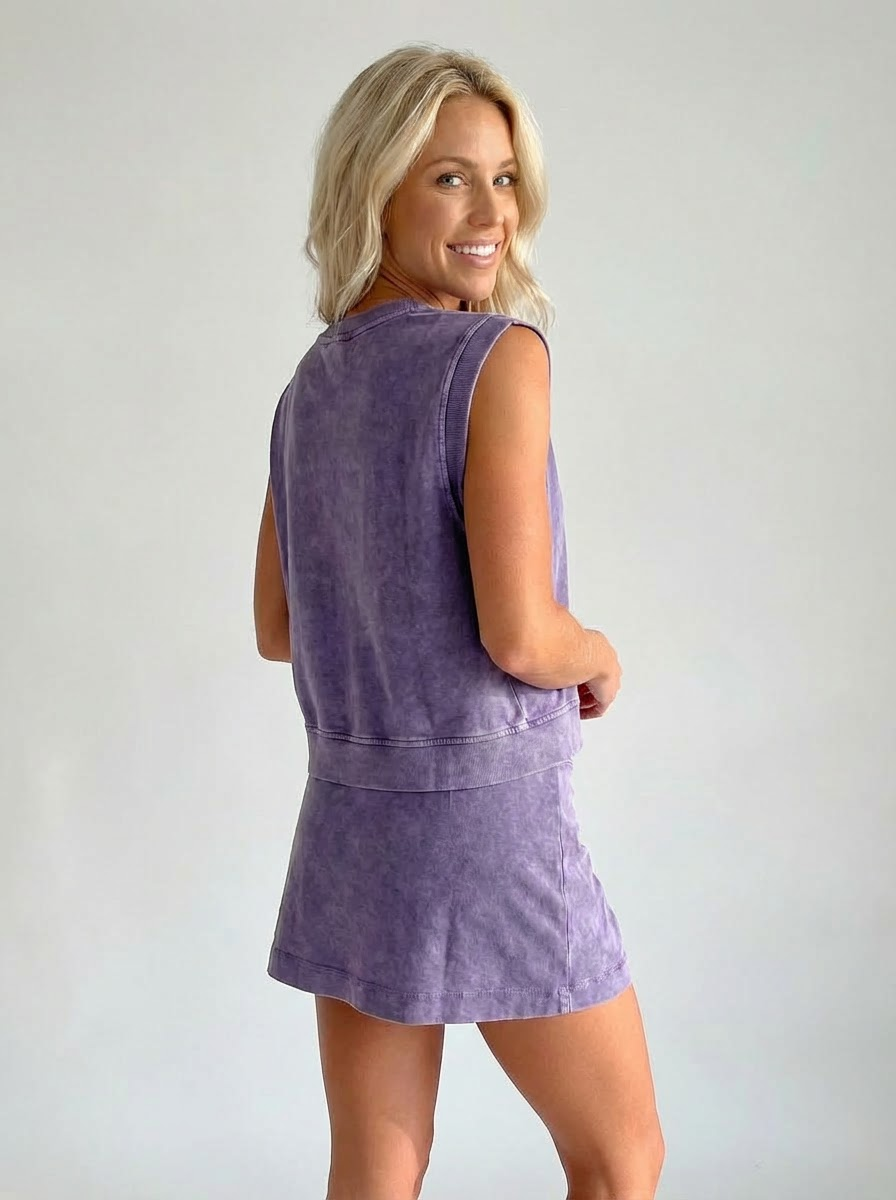 Purple sleeveless crewneck top and matching shorts set, back view
