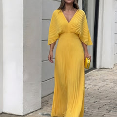 Yellow pleated V-neck maxi dress with gathered waist and three-quarter sleeves