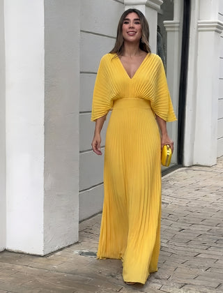 Yellow pleated V-neck maxi dress with gathered waist and three-quarter sleeves