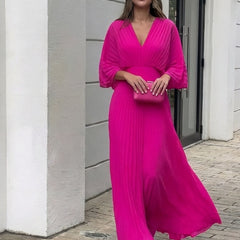 Pink pleated V-neck maxi dress with gathered waist and wide three-quarter sleeves