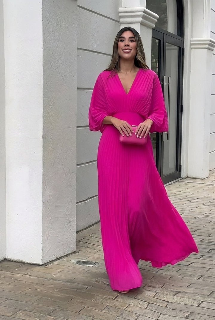 Pink pleated V-neck maxi dress with gathered waist and wide three-quarter sleeves