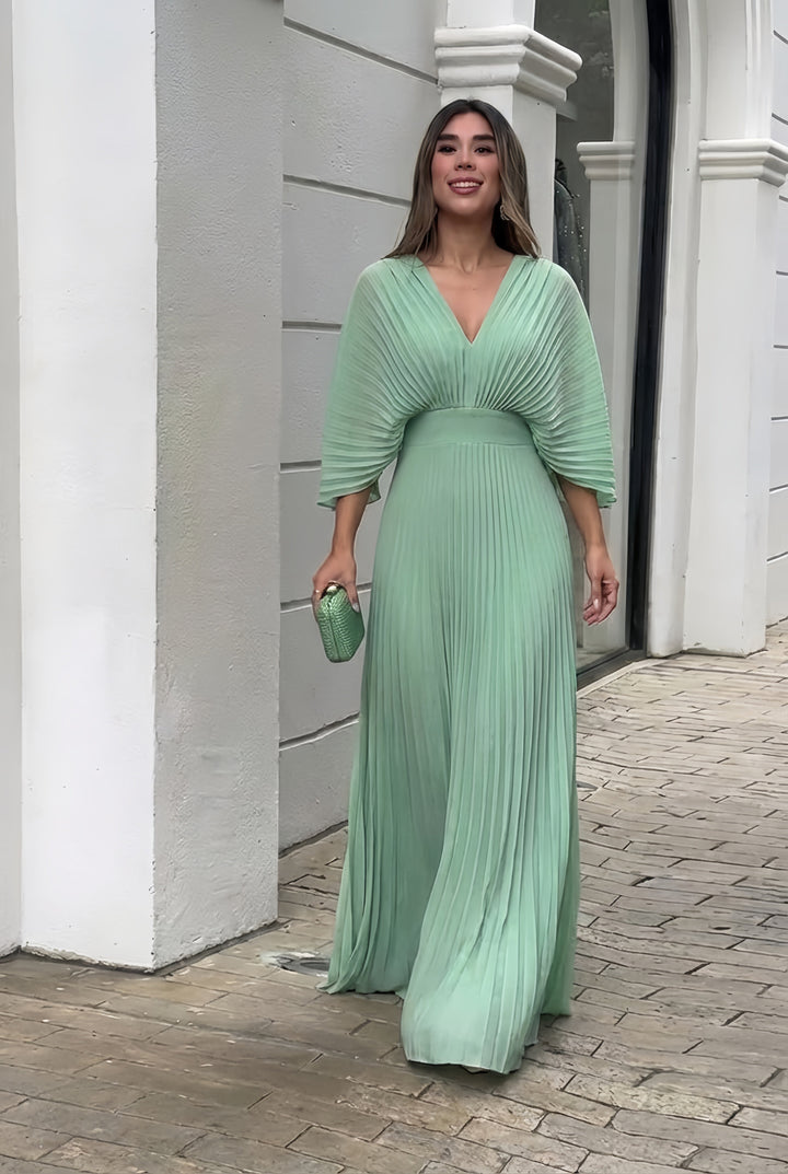 Mint green pleated V-neck maxi dress with gathered waist and three-quarter sleeves