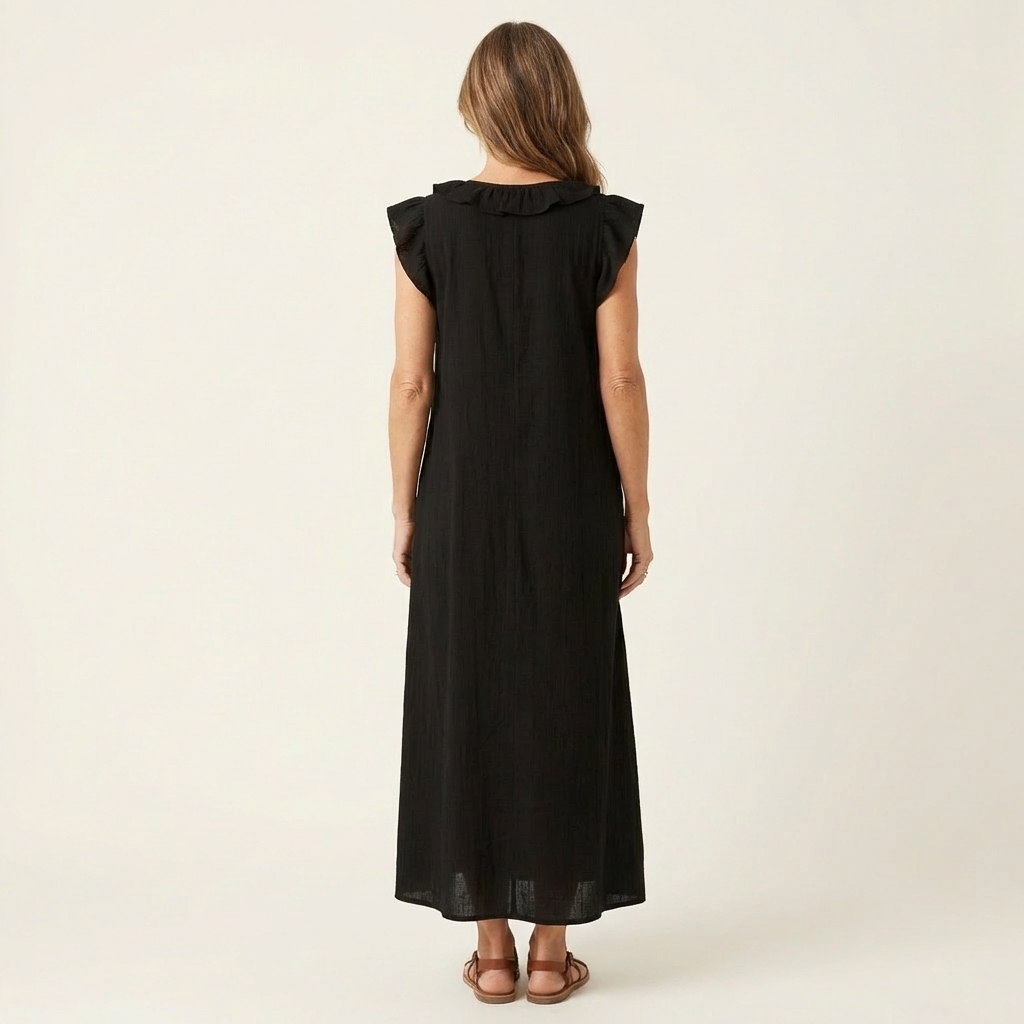 Black linen maxi dress with ruffle-trimmed back yoke and flutter sleeves