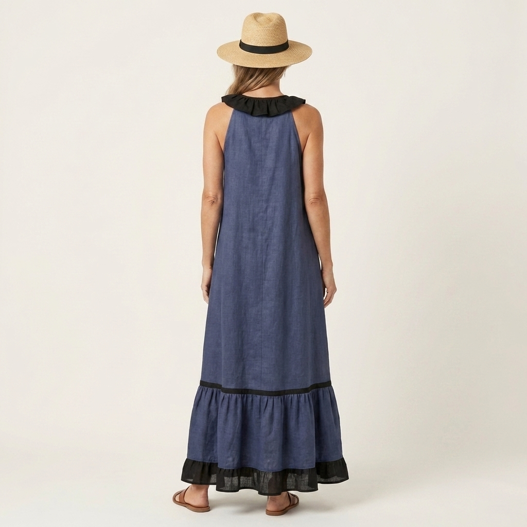 Blue sleeveless maxi dress back view with ruffle collar and black contrast trim