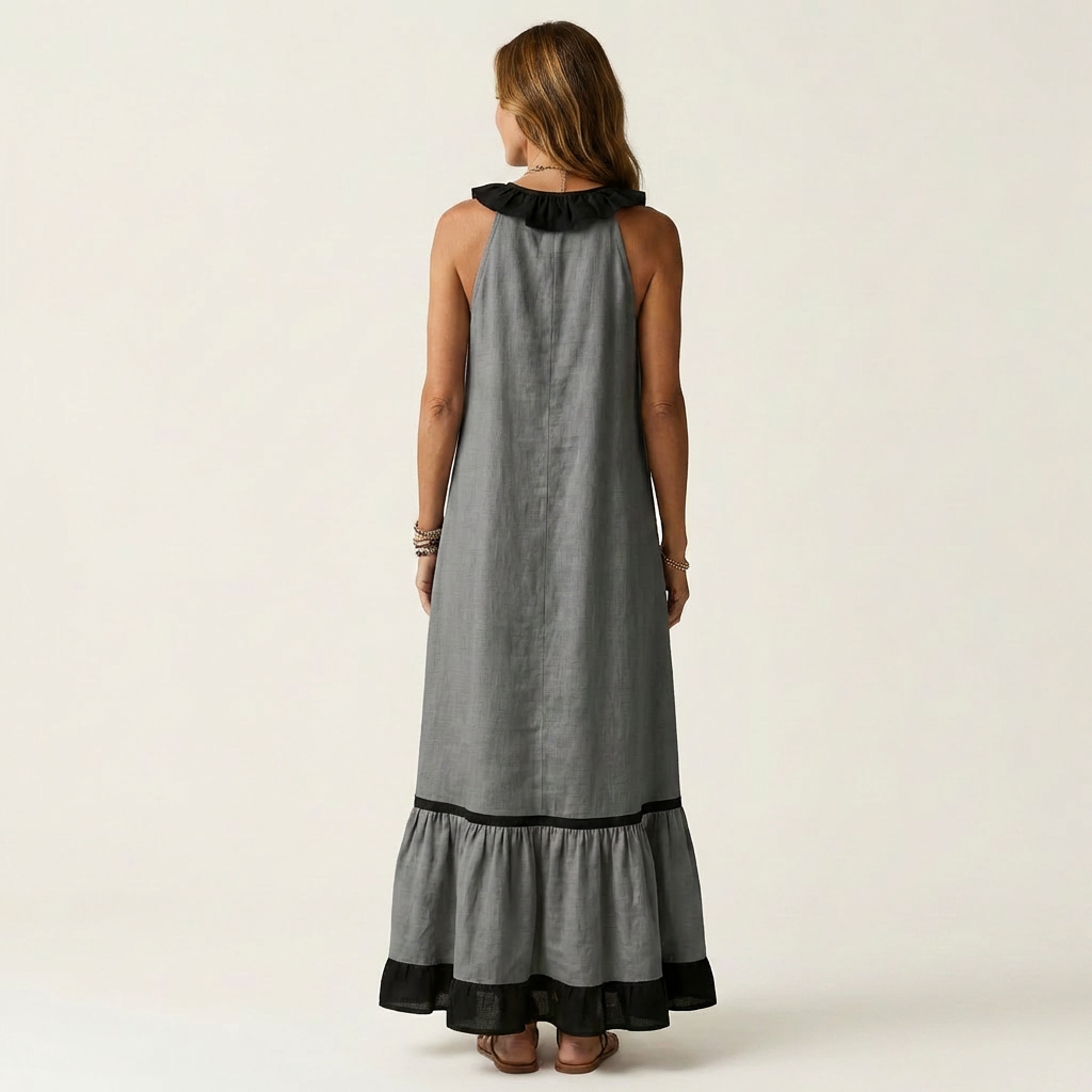 Dark gray sleeveless maxi dress, open back, ruffle collar with black contrast trim