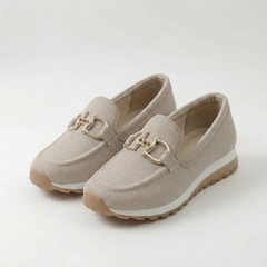 Beige orthopedic loafer sneakers with gold-tone buckle detail and cushioned sole