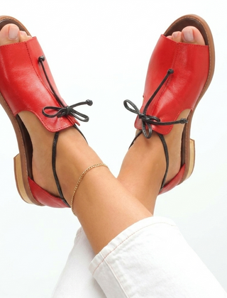 Red leather strap-style sandals with ankle lace tie and open toe
