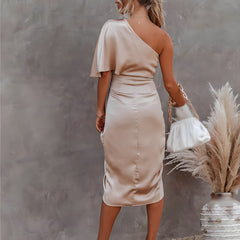 Cream satin one-shoulder party dress with ruched waist and back drape