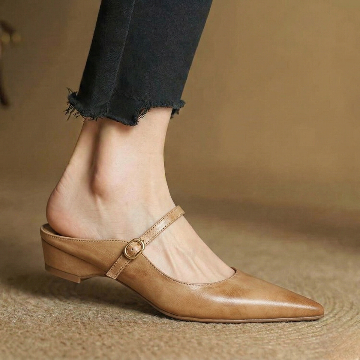 Tan leather mules with pointed toe and buckle ankle strap, low block heel