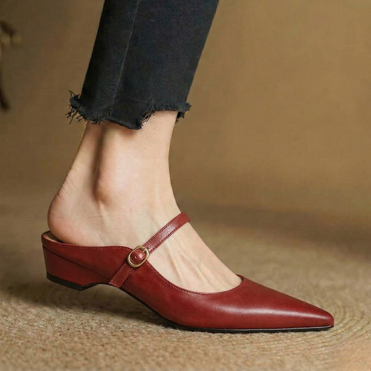 Maroon leather slingback mules with pointed toe and low block heel